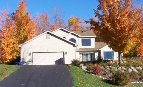 Custom one and a half stories with walkout basement
